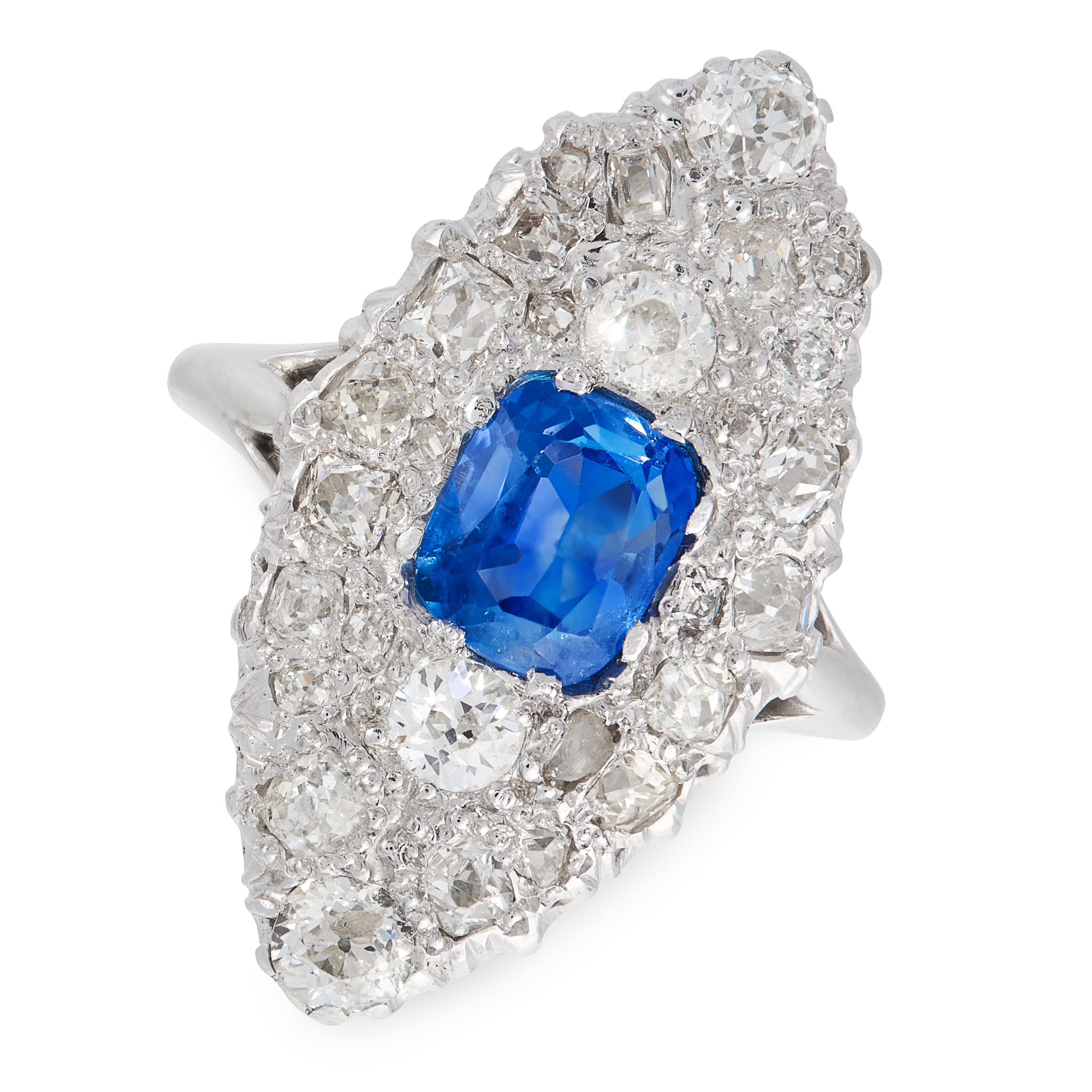 A SAPPHIRE AND DIAMOND DRESS RING in platinum, the navette shaped face set with a central cushion