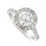 A SOLITAIRE DIAMOND AND PINK DIAMOND DRESS / ENGAGEMENT RING in platinum, set with a round cut