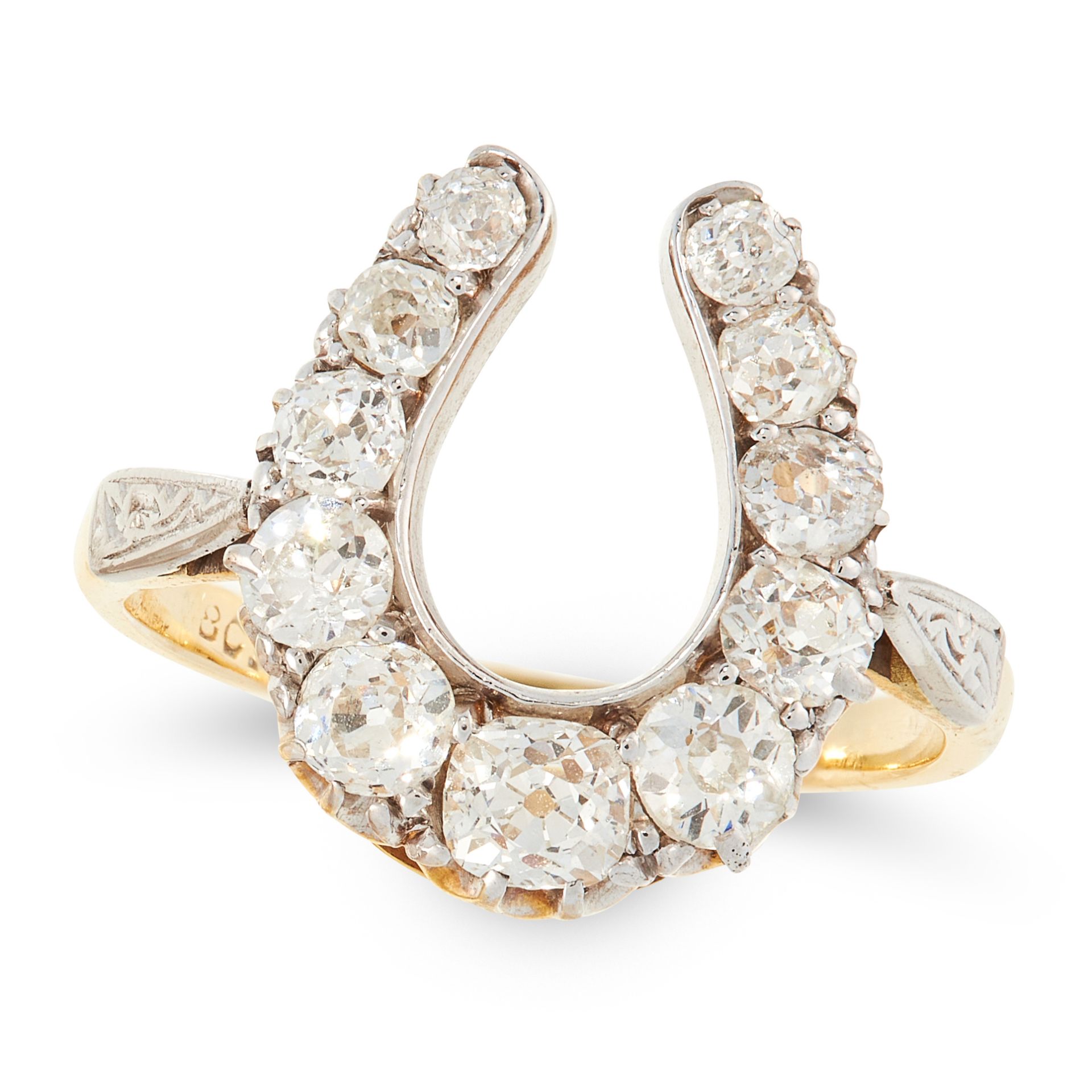 AN ANTIQUE DIAMOND HORSESHOE DRESS RING, CIRCA 1900 in 18ct yellow gold and platinum, designed as