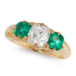 AN ANTIQUE DIAMOND AND EMERALD DRESS RING in high carat yellow gold, set with a central old mine cut