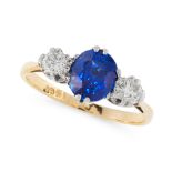 A SAPPHIRE AND DIAMOND DRESS RING in 18ct yellow gold, set with a cushion cut blue sapphire of 1.