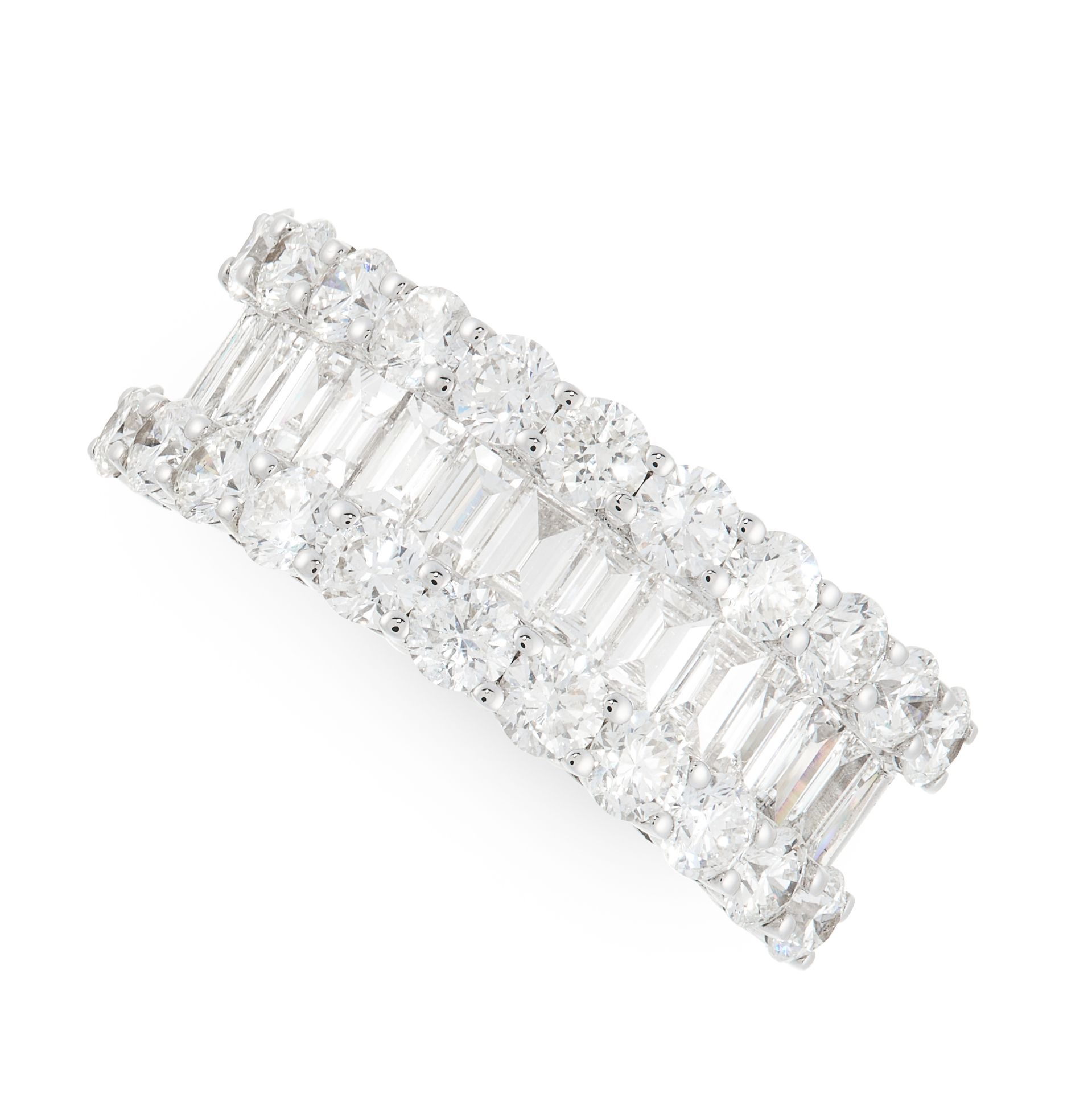 A DIAMOND HALF ETERNITY RING in 18ct white gold, set half way around the band with a row of baguette