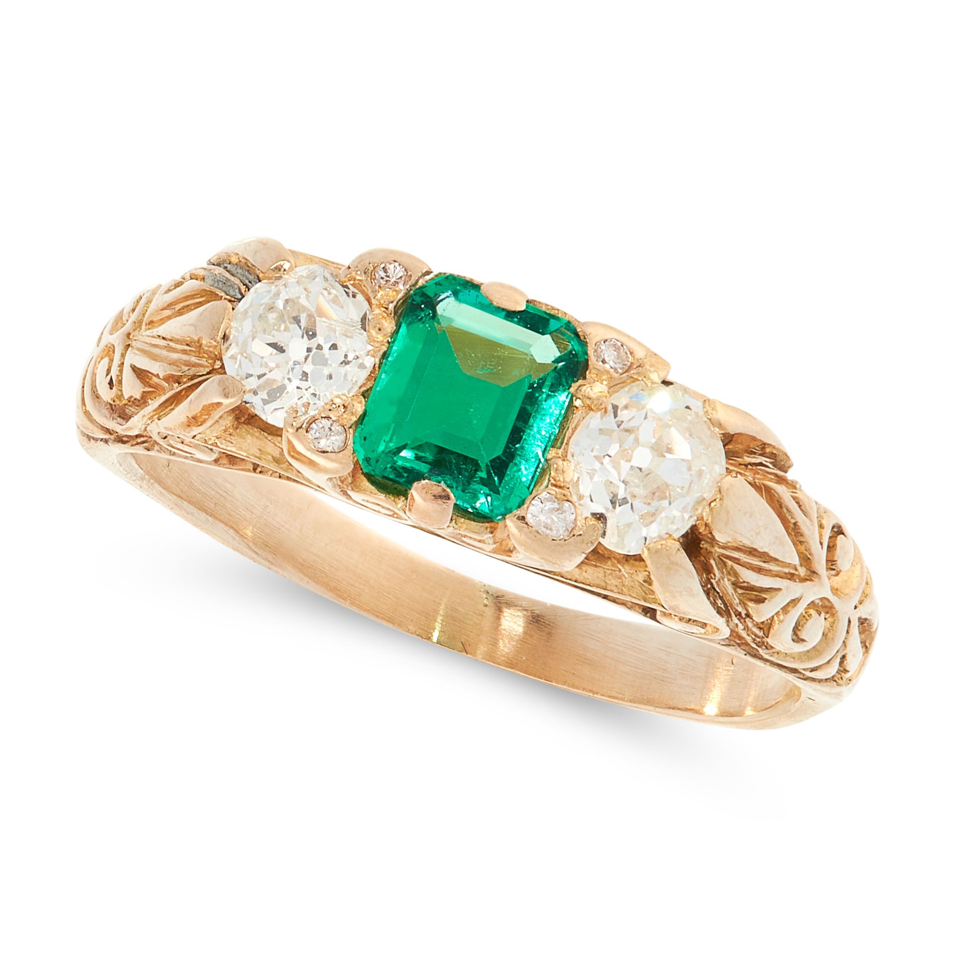 AN ANTIQUE EMERALD AND DIAMOND DRESS RING in high carat yellow gold, set with an emerald cut emerald