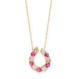 A RUBY AND DIAMOND HORSESHOE PENDANT NECKLACE in yellow gold, the pendant designed as a horseshoe,