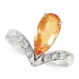 AN IMPERIAL TOPAZ AND DIAMOND DRESS RING in 18ct white gold, set with a pear cut imperial topaz of