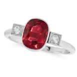 A TOURMALINE AND DIAMOND RING in 9ct white gold, set with a cushion cut tourmaline between two