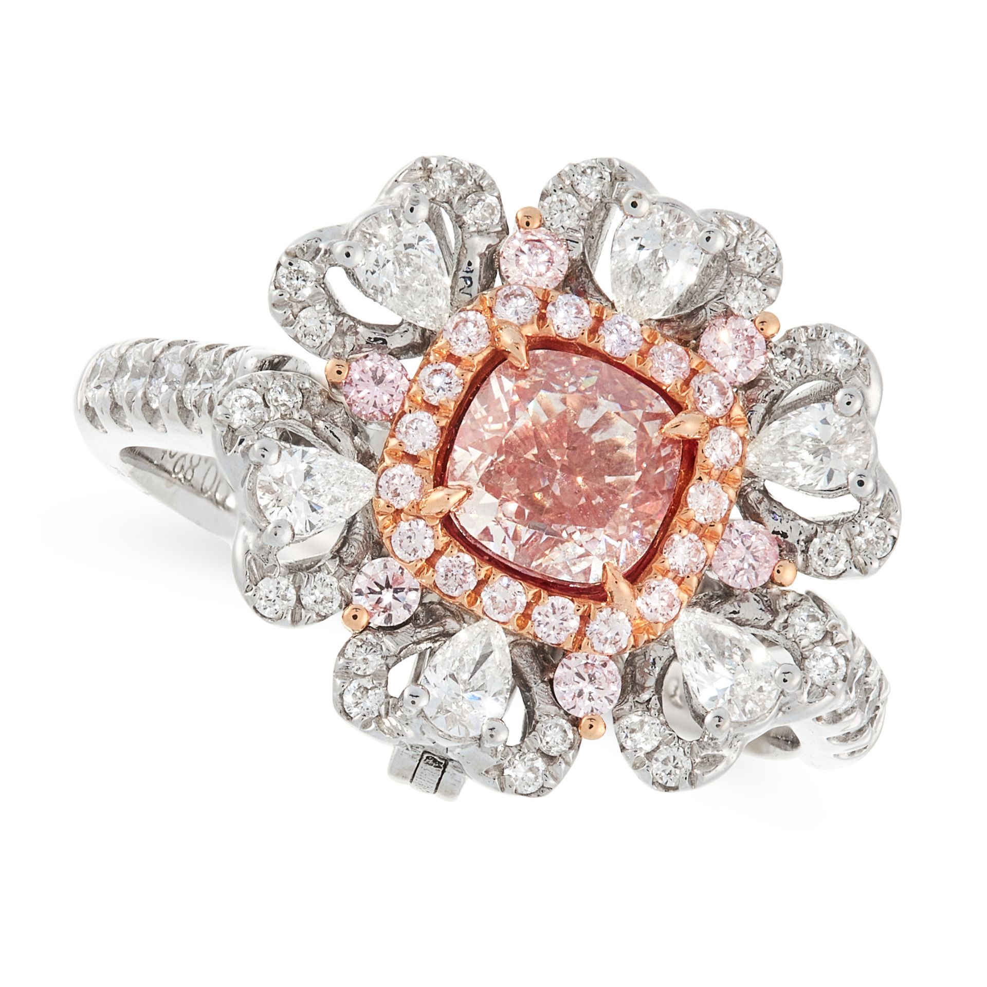 A PINK DIAMOND AND WHITE DIAMOND DRESS RING / PENDANT in 18ct gold, set with a cushion cut fancy