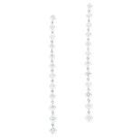 A PAIR OF DIAMOND DROP EARRINGS in 18ct white gold, comprising of a single row of graduated round