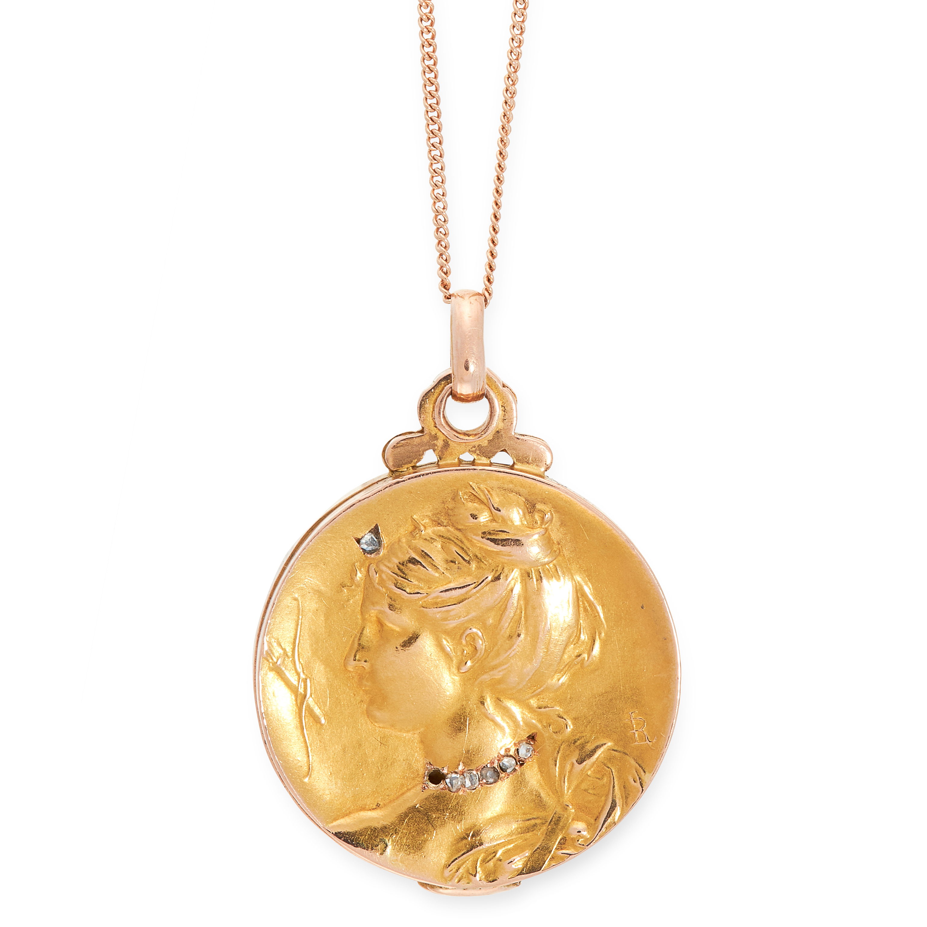 AN ANTIQUE DIAMOND MOURNING LOCKET PENDANT AND CHAIN in high carat yellow gold, the face chased to