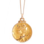 AN ANTIQUE DIAMOND MOURNING LOCKET PENDANT AND CHAIN in high carat yellow gold, the face chased to