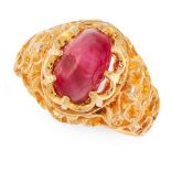 A BURMA NO HEAT RUBY DRESS RING in high carat yellow gold, set with an oval cabochon ruby of 3.10