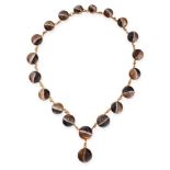 AN ANTIQUE BANDED AGATE NECKLACE comprising a single row of nineteen graduated round banded agate