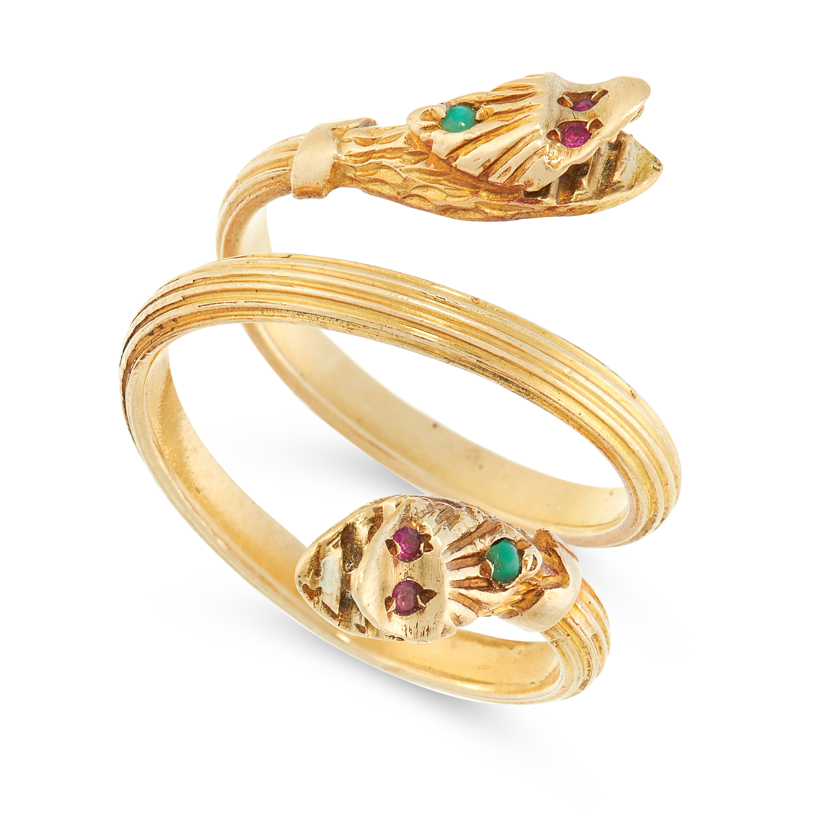 AN ANTIQUE JADE AND RUBY SNAKE RING in yellow gold, designed as two snakes coiled around on