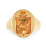 AN INTAGLIO SEAL / SIGNET RING in 18ct yellow gold, the oval face reverse carved to depict a coat of