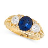 AN ANTIQUE SAPPHIRE AND DIAMOND DRESS RING in high carat yellow gold, set with a cushion cut blue