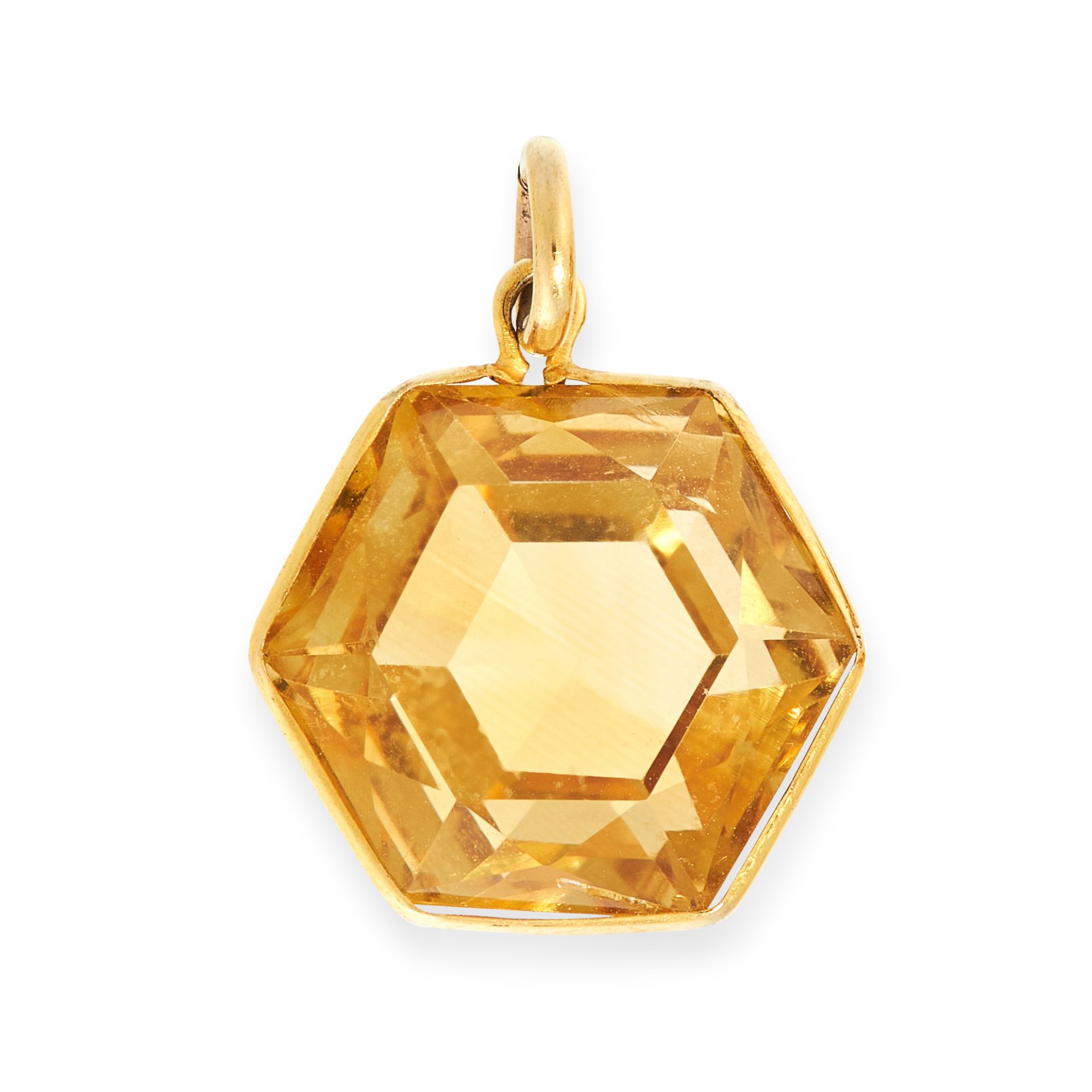 AN ANTIQUE CITRINE PENDANT, EARLY 20TH CENTURY in yellow gold, set with a hexagonal step cut