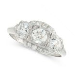 AN ART DECO DIAMOND DRESS RING, EARLY 20TH CENTURY in platinum, set with a trio of graduated old cut