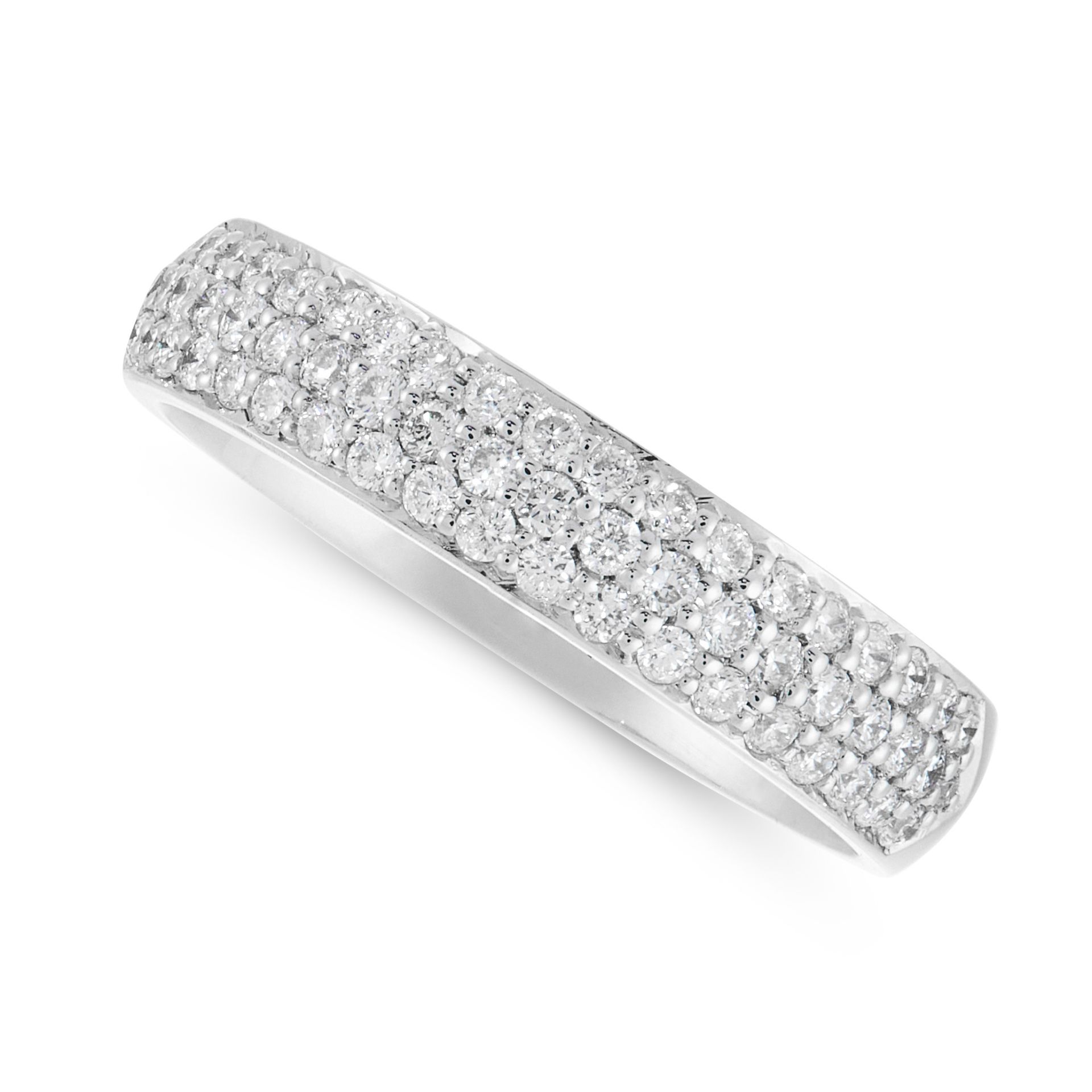A DIAMOND BAND RING in platinum, the band is half set with three rows of round cut diamonds, stamped