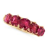 AN ANTIQUE UNHEATED RUBY DRESS RING in high carat yellow gold, set with five graduated cushion cut