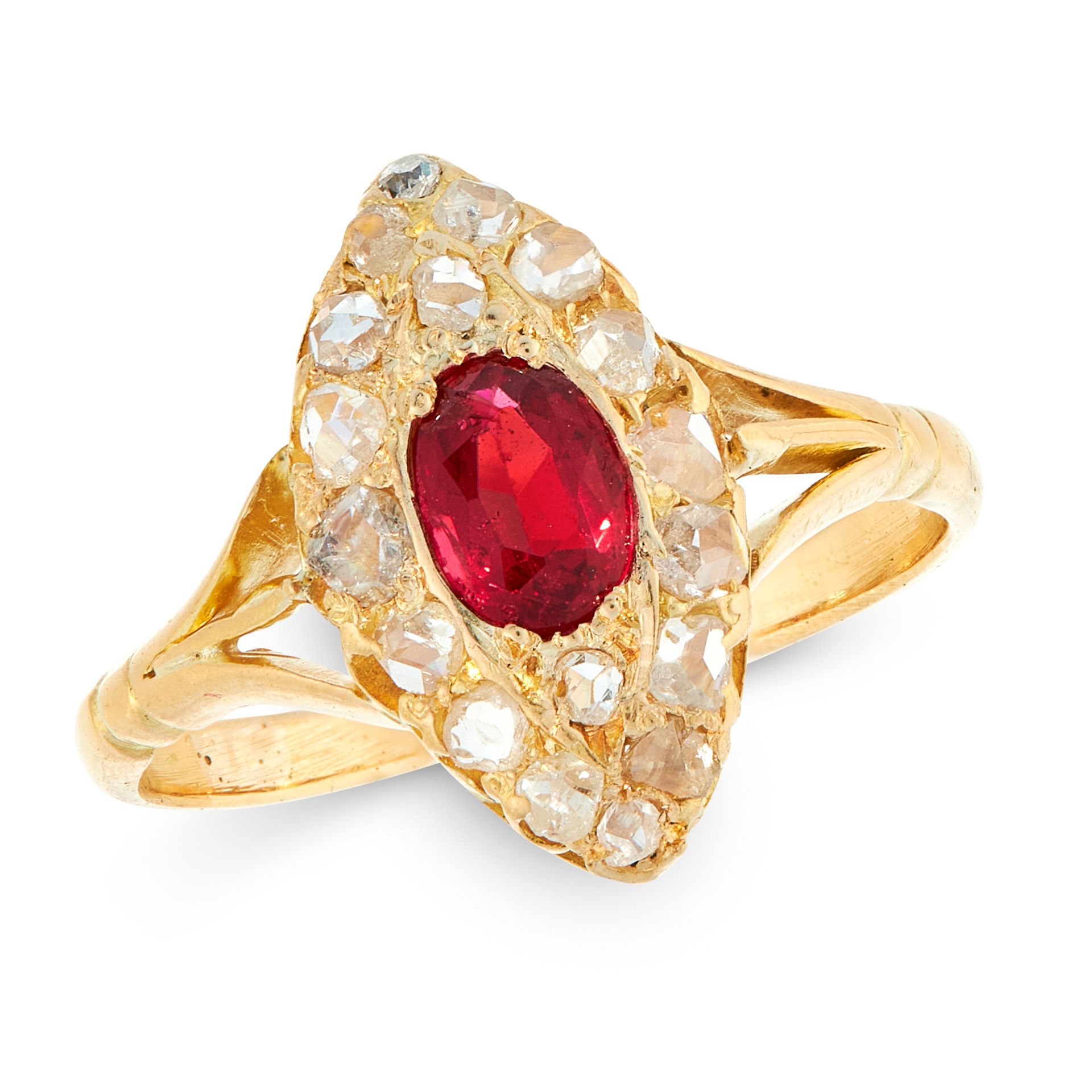 AN ANTIQUE RUBY AND DIAMOND DRESS RING in high carat yellow gold, set with a cushion cut ruby within