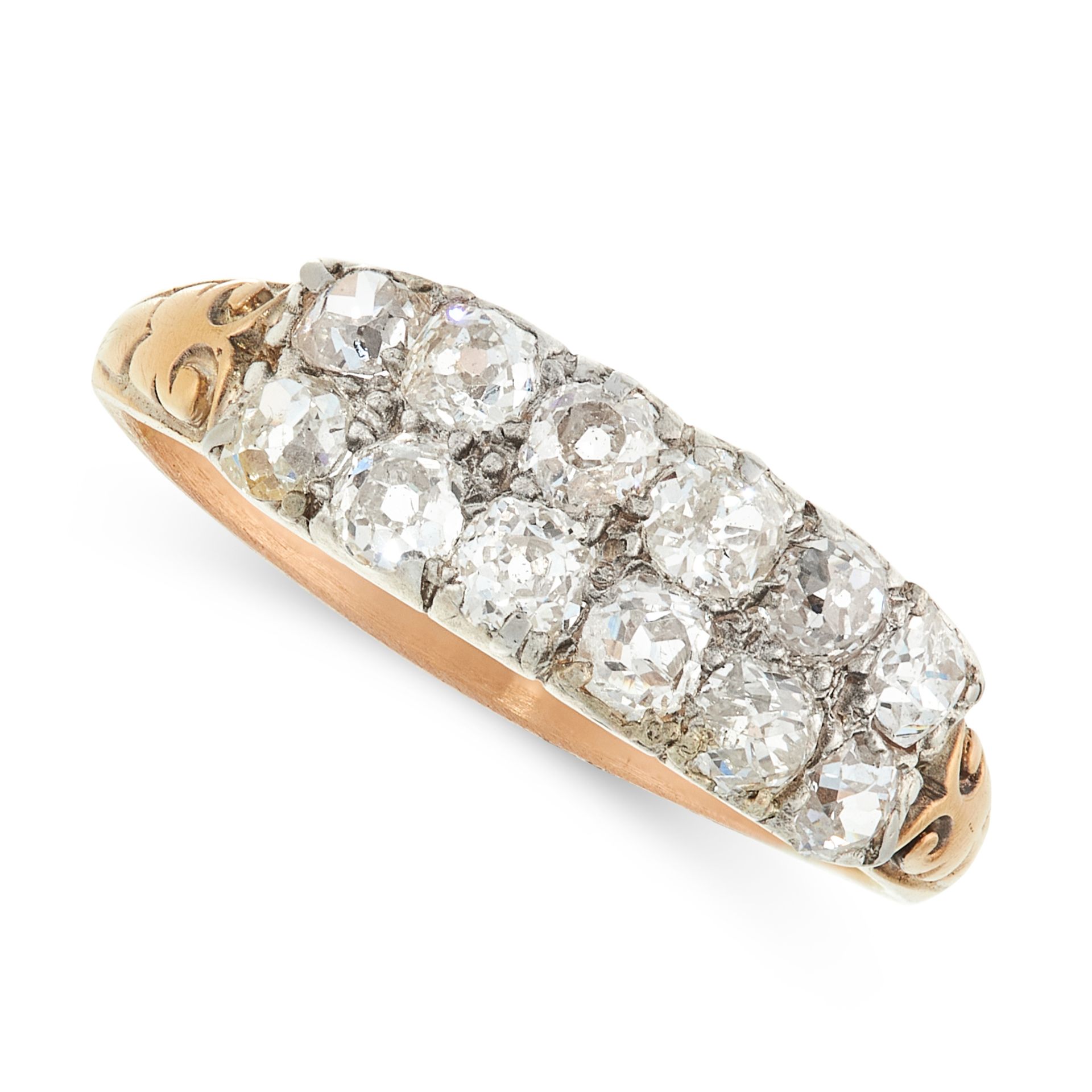 AN ANTIQUE DIAMOND DRESS RING, 19TH CENTURY in yellow gold and silver, set with two rows of old