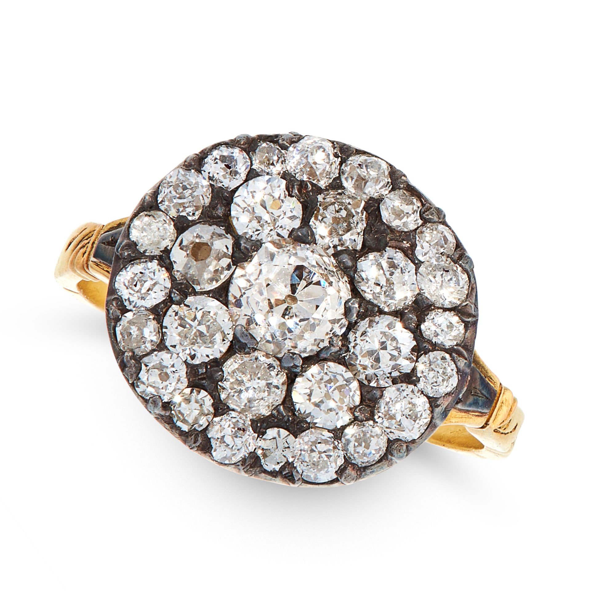 AN ANTIQUE DIAMOND DRESS RING, CIRCA 1800 in yellow gold and silver, the circular face set with a