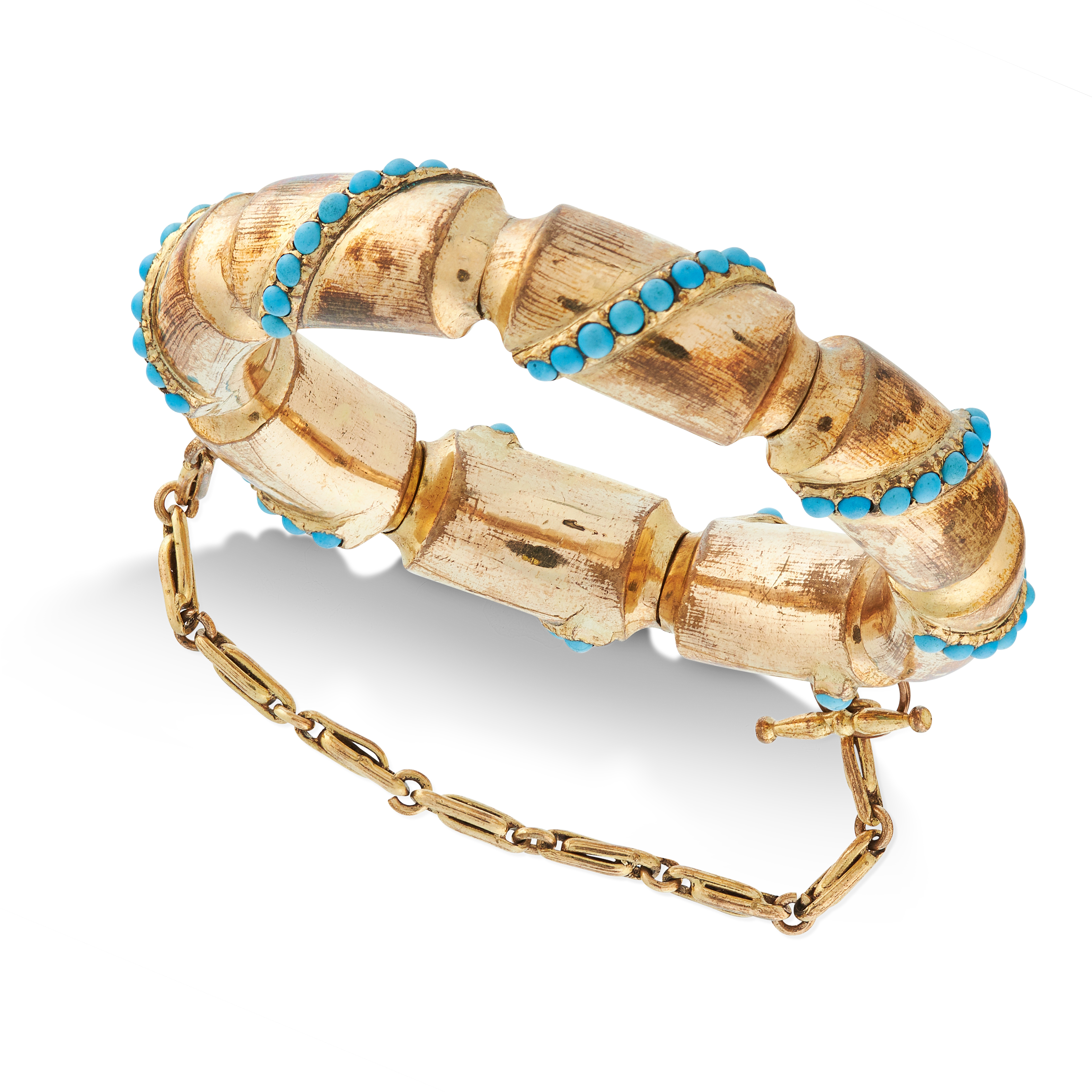 AN ANTIQUE ARTICULATED TURQUOISE BANGLE, 19TH CENTURY formed of eight tubular links set with rows of