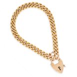 AN ANTIQUE HEART PADLOCK CHARM BRACELET, CIRCA 1900 in 15ct yellow gold, the curb link bracelet with