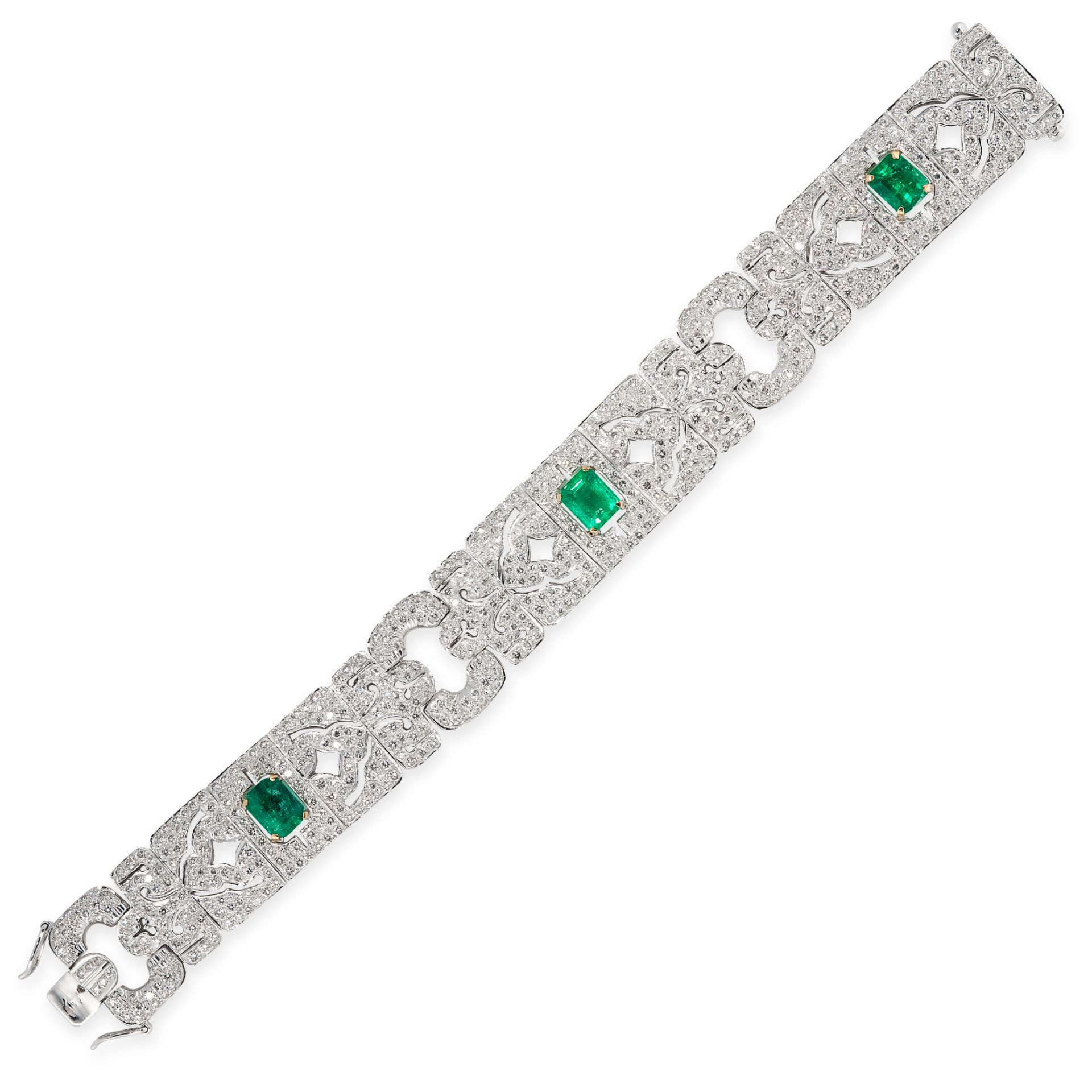 AN EMERALD AND DIAMOND BRACELET in 18ct white gold, set with a trio of emerald cut emeralds of 1.65,