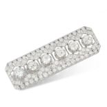 AN ART DECO DIAMOND BROOCH in platinum and 18ct white gold, set with a row of six old cut diamonds