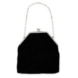 A DIAMOND, PEARL AND ENAMEL EVENING BAG / PURSE, CARTIER the black mesh bag with geometric rim