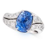 A CEYLON NO HEAT SAPPHIRE AND DIAMOND DRESS RING set with a cushion cut blue sapphire of 4.23 carats