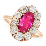 A BURMA NO HEAT RUBY AND DIAMOND DRESS RING in high carat yellow gold, set with a cushion cut ruby