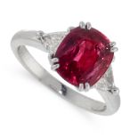 AN UNHEATED RUBY AND DIAMOND DRESS RING in 18ct yellow gold, set with a cushion cut sapphire of 3.29