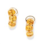 A PAIR OF VINTAGE CITRINE CLIP EARRINGS, BULGARI in 18ct yellow gold, each set with a trio of oval