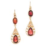 A PAIR OF ANTIQUE GARNET EARRINGS in yellow gold, set with pear cut and oval cut garnets accented by