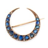AN ANTIQUE VICTORIAN SAPPHIRE AND DIAMOND CRESCENT BROOCH in yellow gold, the crescent form is set