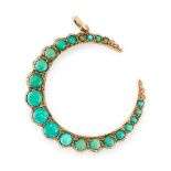 AN ANTIQUE TURQUOISE CRESCENT MOON PENDANT, 19TH CENTURY in yellow gold, set with round cabochon