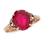 A RED GEMSTONE RING in 9ct yellow gold, set with an oval cut red paste gemstone, stamped 9ct, size N