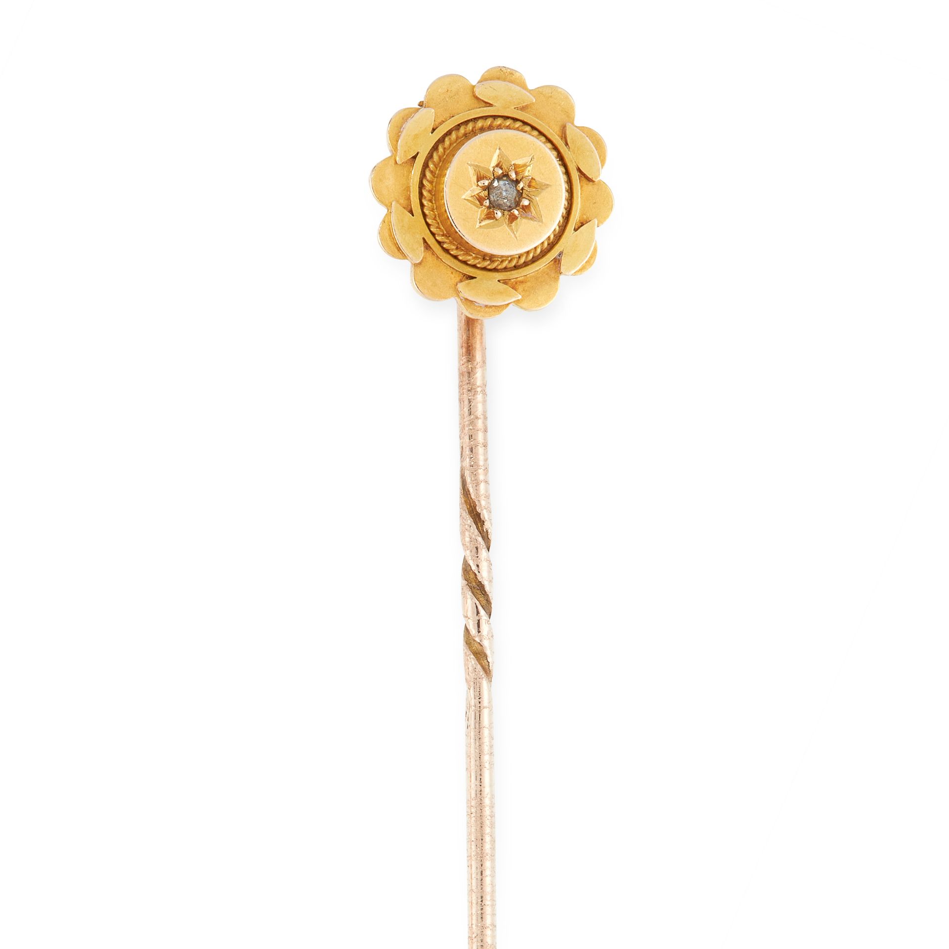 AN ANTIQUE DIAMOND TIE PIN BROOCH in 15ct yellow gold, set with rose cut diamond in a star motif