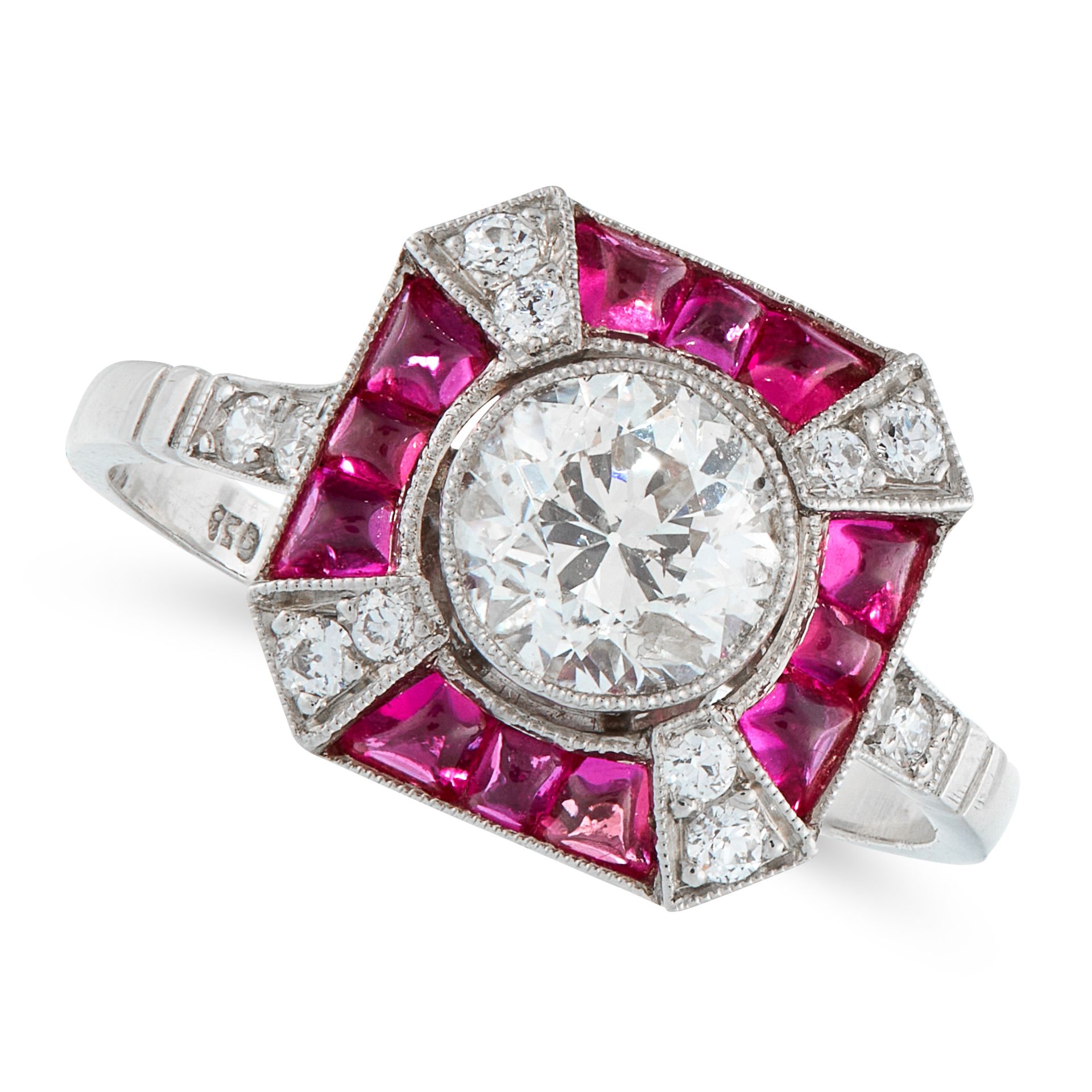 A RUBY AND DIAMOND DRESS RING in platinum, in Art Deco design, set with a round cut diamond of