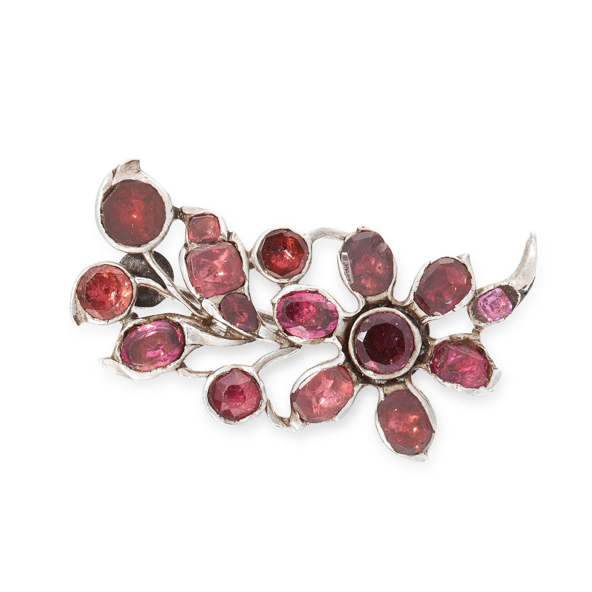 AN ANTIQUE GARNET BROOCH, 19TH CENTURY in silver, designed as a spray of foliage, set with flat