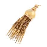 AN ANTIQUE TASSEL PENDANT, 19TH CENTURY in yellow gold, suspending a series of articulated