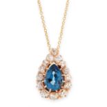 AN ANTIQUE SAPPHIRE AND DIAMOND PENDANT AND CHAIN in 18ct yellow gold, the pendant set with a pear
