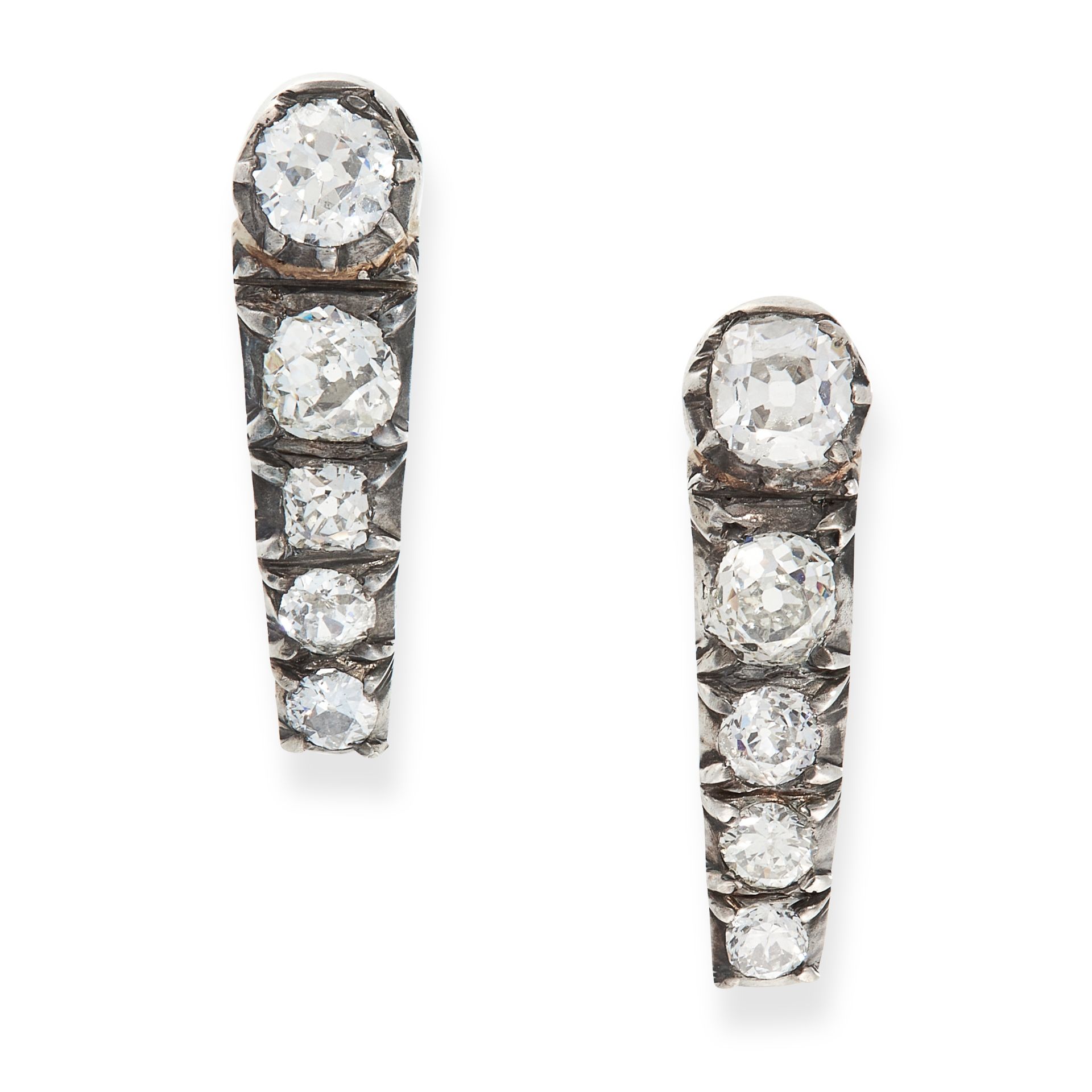 A PAIR OF ANTIQUE DIAMOND EARRINGS in yellow gold and silver, each set with five graduated old cut