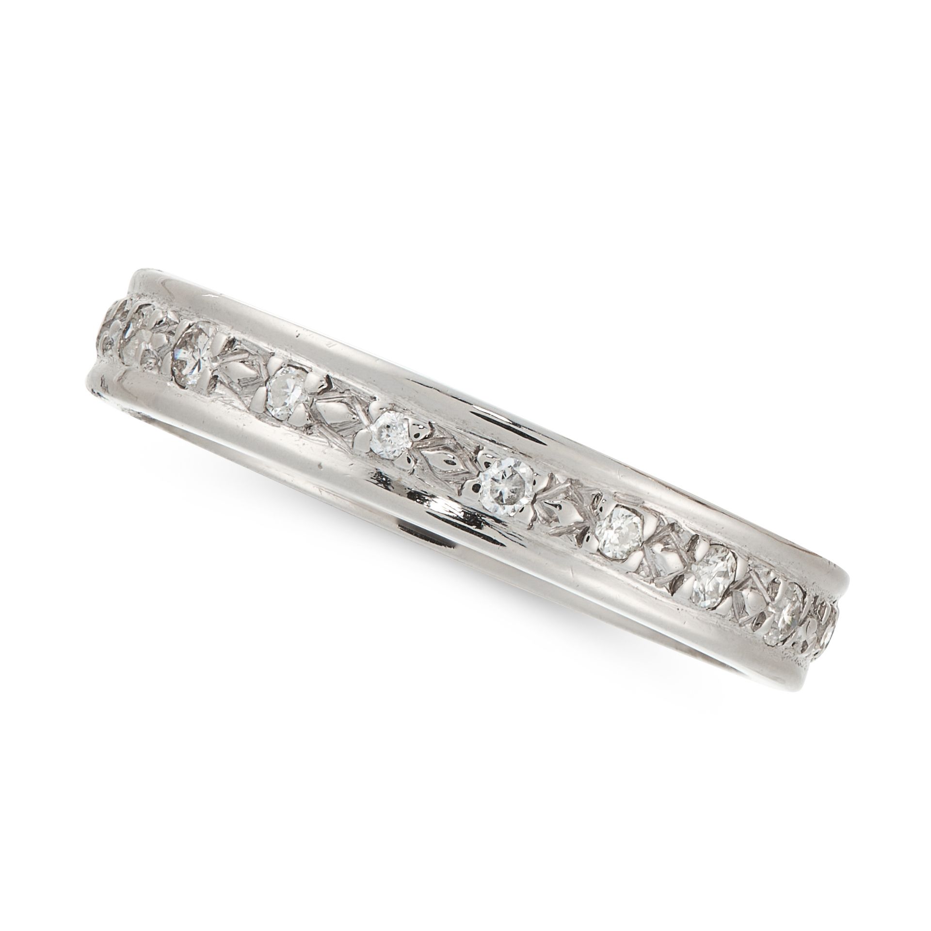 A DIAMOND ETERNITY RING set with round cut diamonds totalling 0.4-0.5 carats, unmarked, size Q /