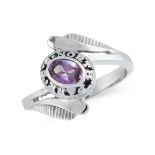 A NORTH PARK CHICAGO UNIVERSITY COLLEGE RING in 14ct white gold, set with an oval cut amethyst,