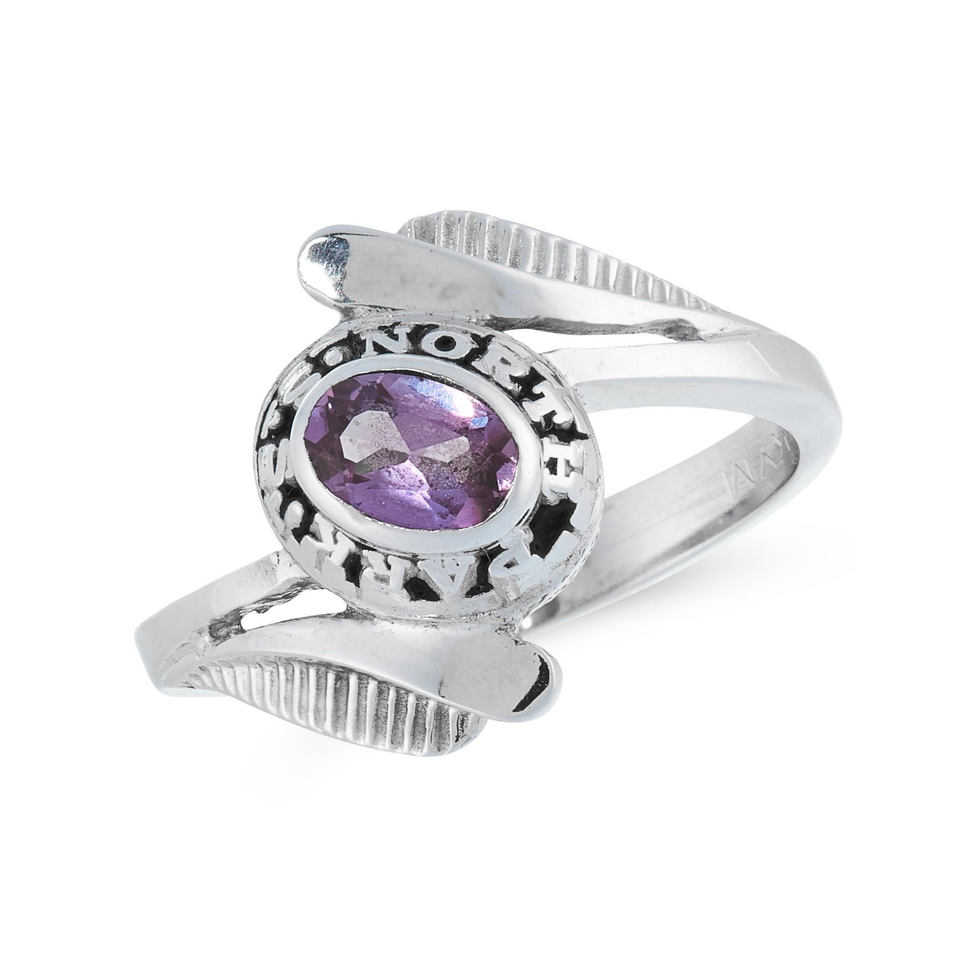 A NORTH PARK CHICAGO UNIVERSITY COLLEGE RING in 14ct white gold, set with an oval cut amethyst,