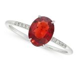 A RED SPINEL AND DIAMOND DRESS RING in 18ct white gold, set with an oval cut red spinel of 1.33