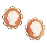 A PAIR OF CAMEO STUD EARRINGS in yellow gold, each set with a cameo of a lady in a scrolling gold